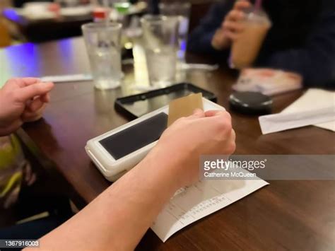 Person Tapping Card Photos And Premium High Res Pictures Getty Images