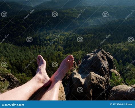 Naked Male Legs Take Rest On Peak Outdoor Activities Stock Photography
