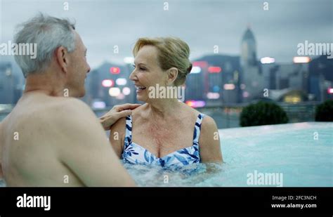 Couple In Hong Kong Hotel Rooftop Jacuzzi Pool Stock Video Footage Alamy