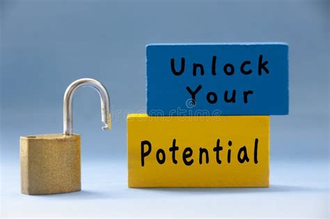 Unlock Your Potential Text On Wooden Blocks With Pad Lock On Light Blue