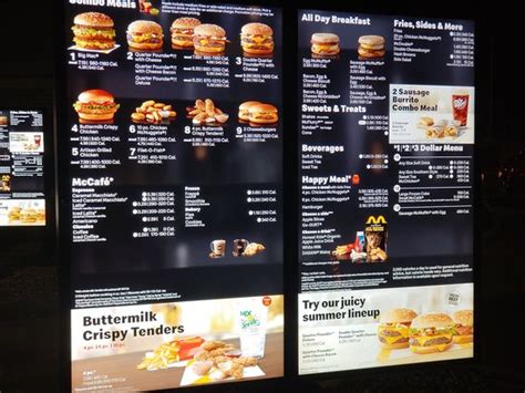 The mcdonald's lunch menu lists popular favorites including the big *offer valid 1x use each friday thru 6/27/21 with minimum purchase of $1 (excluding tax). menu board at McDonald's drive-thru - Picture of McDonald ...