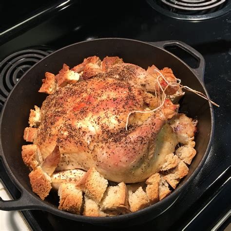 Chicken Roasted In My Cast Iron Dutch Oven On A Bed Of Bread Chunks And Garlic The Chicken Is