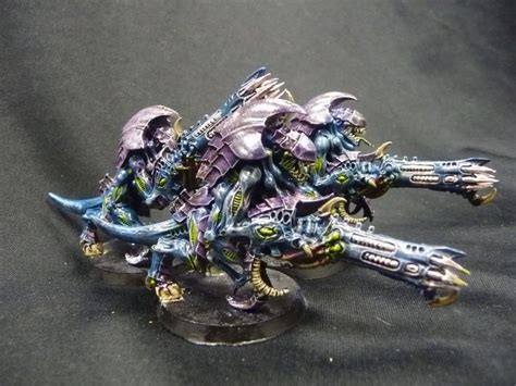 The Warhammers Are Painted In Silver And Blue