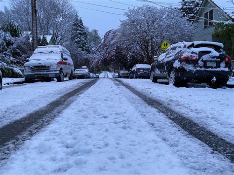Thousands Without Power As Rare Spring Snowstorm Blankets Portland