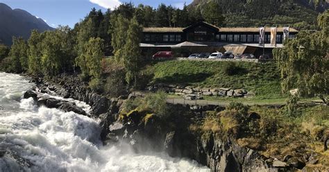 The Waterfall Prestfossen Waterfall River In Lom Lom Jotunheimen