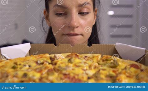 woman with eating disorder looking at pizza dieting woman fast food addiction stock footage