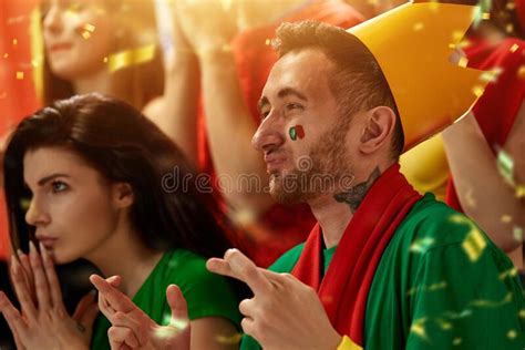 Portugal Football Fans Emotionally Watching Match Game At Stadium