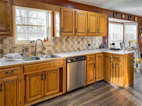 In this way, what color countertops look best with oak cabinets? Honey oak kitchen cabinets-07 - Painted by Kayla Payne