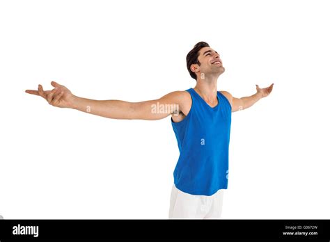 Excited Male Athlete With Arms Outstretched Stock Photo Alamy