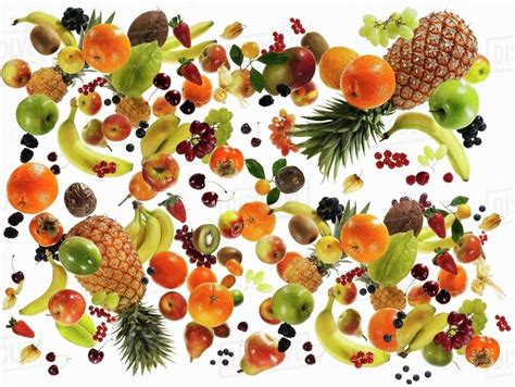 Many Different Types Of Fruit Against White Background Stock Photo