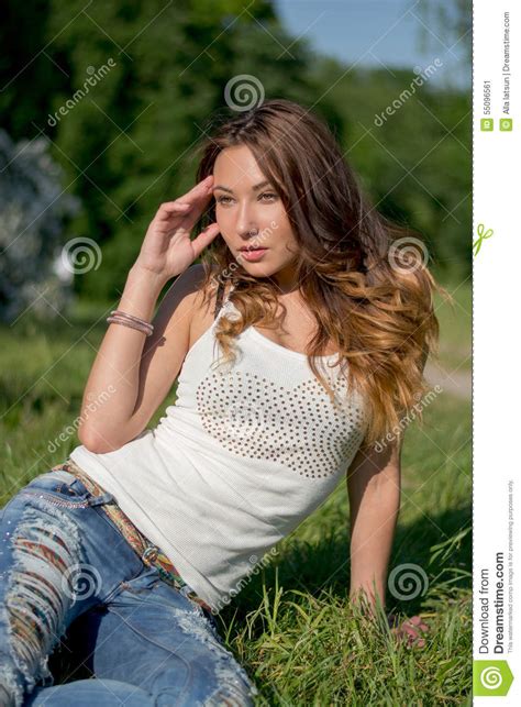 Beautiful Girl Is Resting On A Grass Stock Image Image
