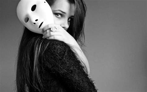 online crop greyscale photo of woman in black top holding white mask hd wallpaper wallpaper