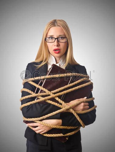 Woman Businessman Tied Up With Rope Stock Photo Crushpixel