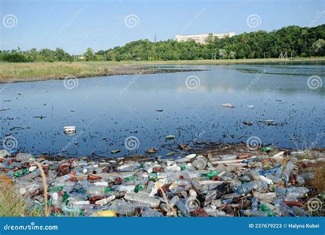 The Lake And The Shore Are Littered With Garbage Stock Image Image Of