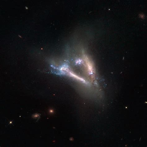 Hubble Views A Pair Of Interacting Galaxies Known As Ic 2184