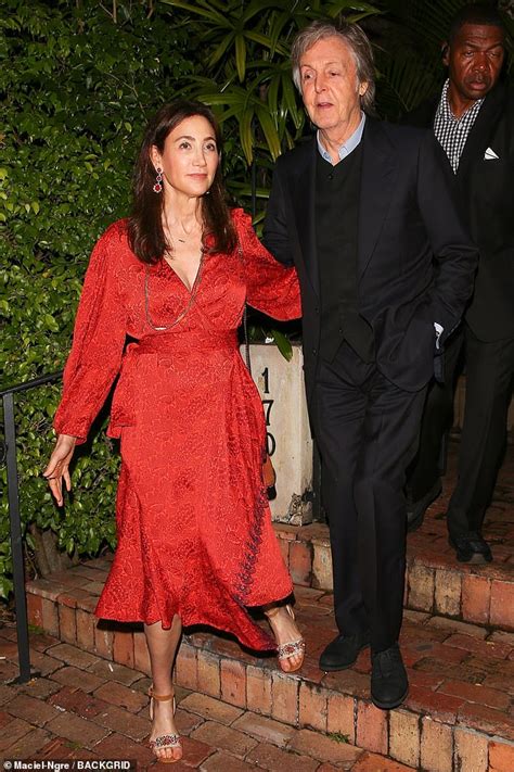 Paul mccartney and his wife nancy shevell packed their bags for the holidays and headed down to st. Paul McCartney's wife Nancy Shevell, 60, dazzles in a scarlet wrap dress on dinner date | Daily ...