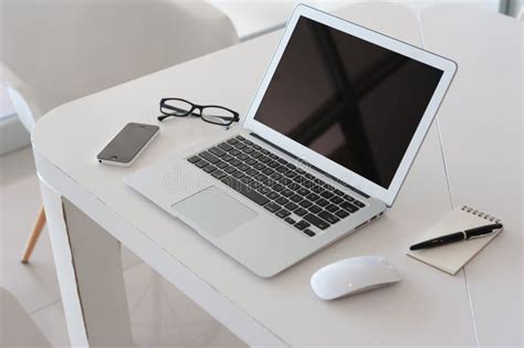 Laptop With Smartphone And Note Book On Table Stock Image Image Of