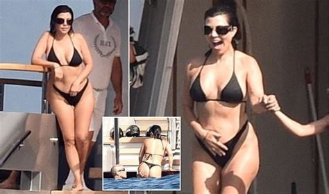 Kourtney Kardashian Flaunts Her Figure In A Black Bikini In Portofino