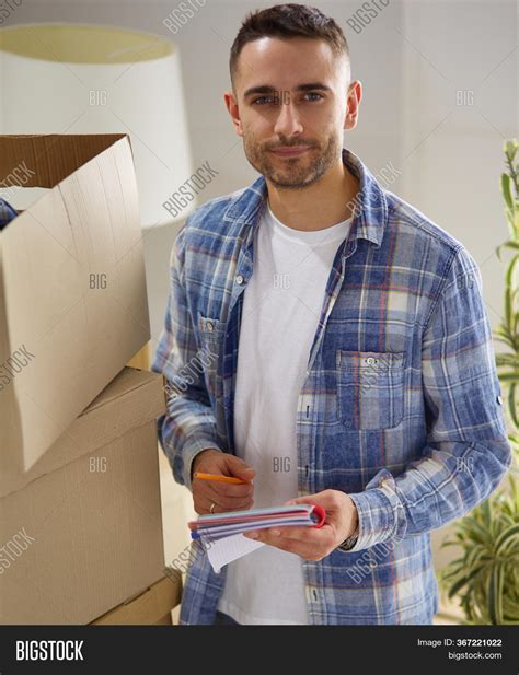 Moving Man Sitting On Image And Photo Free Trial Bigstock