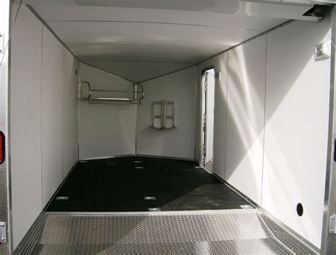 Renovation of our food trailer's floor. Rubber coin floor, low rider pan, recessed wheel chocks. | Motorcycle trailer, Trailer interior ...
