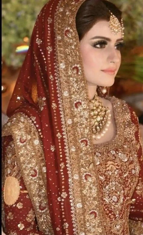 Beautiful Pakistani Bride In Her Wedding Dress And Jewellery