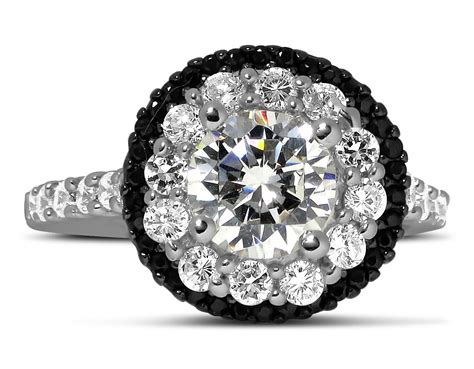 Black diamonds are treated to create permanent, intense black color. Luxurious 1 Carat Black and White Round Diamond Halo ...