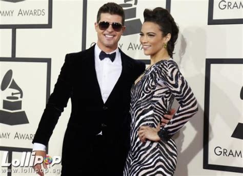 robin thicke misses late father s tribute after ex wife paula patton files restraining order