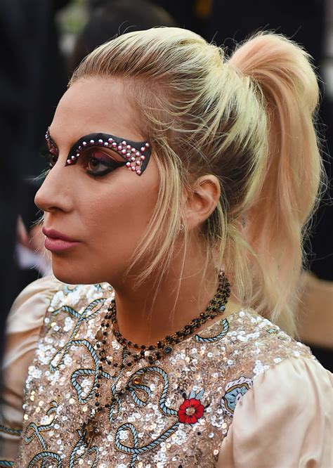 I think that only lady gaga knows why she dyed her hair blonde. Lady Gaga Ponytail - Lady Gaga Looks - StyleBistro