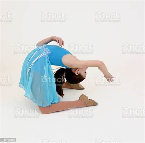 Girl In Costume Doing A Backbend Stock Photo Download Image Now