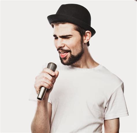 Young Man Singing With A Microphone Stock Image Image Of Showing