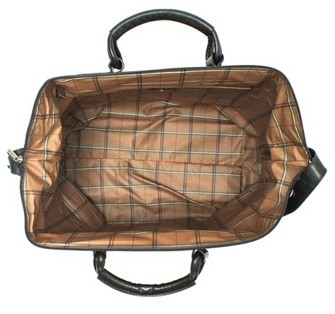 Logo on the side and is finished with sturdy metal hexagons. Tony Perotti Italian Leather Weekend Getaway Travel Duffle ...