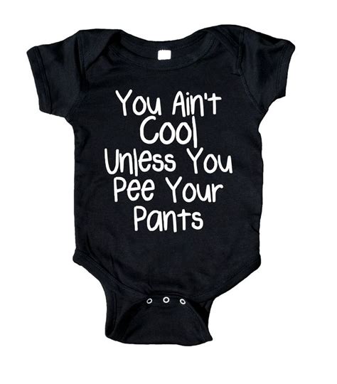 A Black Bodysuit With White Writing That Says You Aint Cool Unless You Pee Your Pants