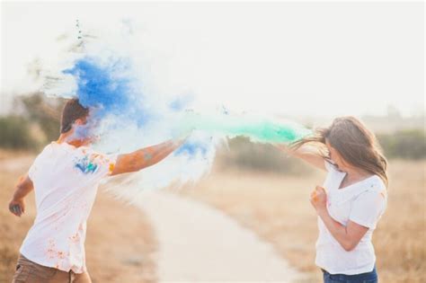 A Fun Paint Throwing Engagement Shoot Colourful Engagement Shoot On