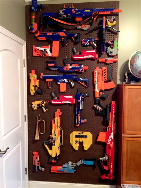 I'm glad nerf blasters exist. Nerf gun storage. $50 worth of materials, a couple of hours of work, and now no more Nerf Guns ...