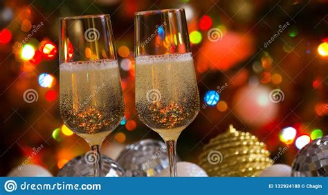Local nonprofit business association fostering a vibrant, inviting and active see more of champaign center partnership on facebook. Two Champagne Glasses And Christmas Balls Stock Photo ...