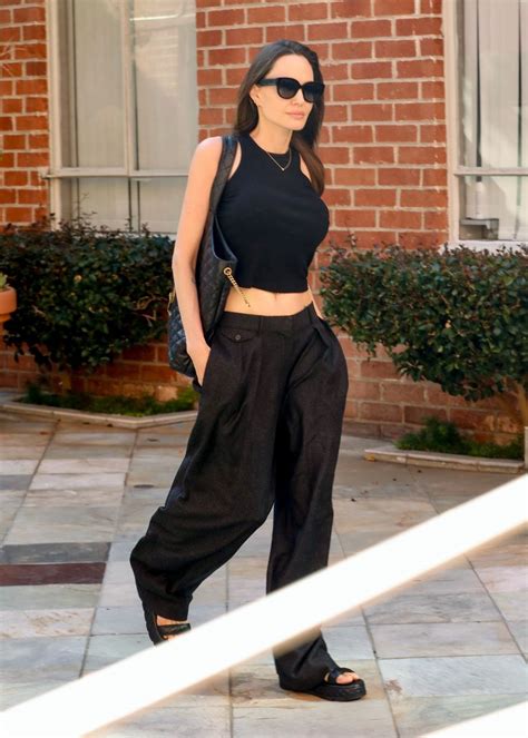 Angelina Jolie Goes Casual In Breezy Trousers And A Cropped Tank