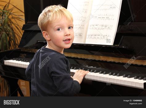 Young Boy Plays Piano Image & Photo (Free Trial) | Bigstock