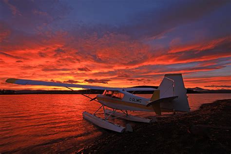 A Float Plane Facing The Sunrise Photograph By Robert Postma