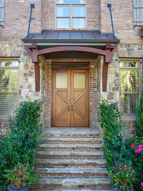 Front Stairs And Entryway On A Brick And Stone Home Front Door Design