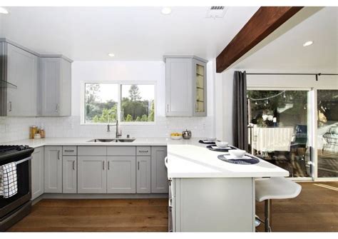 If you are considering white to reface your existing kitchen cabinets, or for new cabinetry the matte desert gray subway tile backsplash also adds a subtle textural interest. Top 7 Amazing Kitchen Countertop Ideas for Your Grey Cabinets