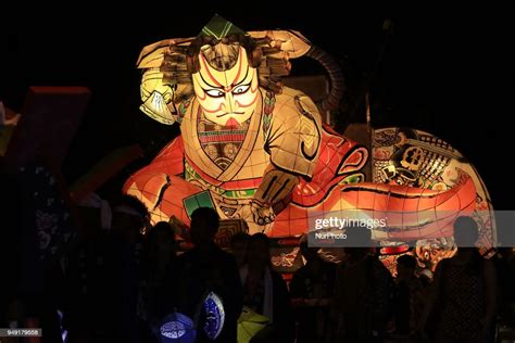 A Traditional Japanese Nebuta Float Is On Display During A Parade At