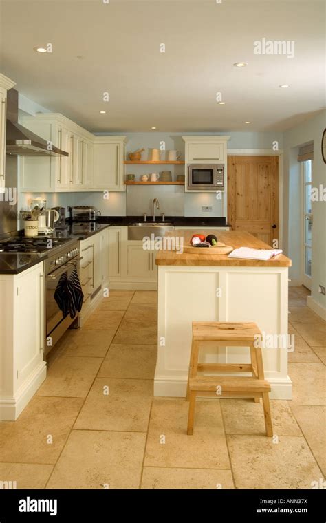 Home Interior Small Contemporary Fitted Kitchen With Island Unit Stock