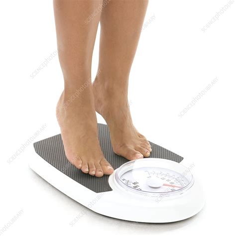 Woman Weighing Herself Stock Image F0028339 Science