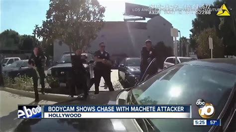 video shows officers confronting machete wielding man youtube