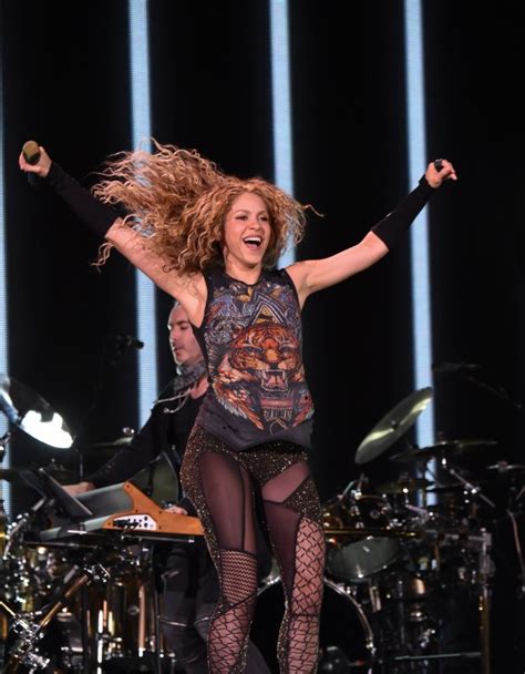 Shakira Shakes Her Hips Plays The Hits And Spreads Glitter All Over