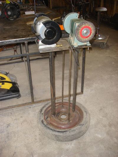 Made a bench grinder stand that hilds 2 bench grinders, in case you need 4 different wheels but dont have the bench space. Bench grinder stand | MIG Welding Forum