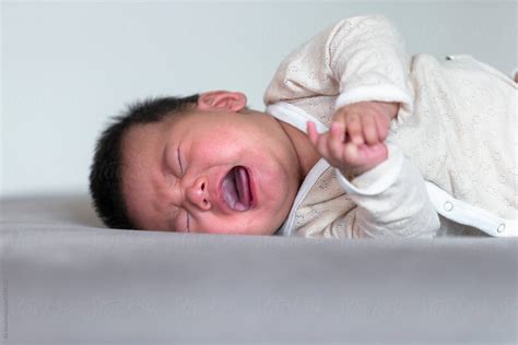 Newborn Baby Crying At Home By Stocksy Contributor Bo Bo Stocksy