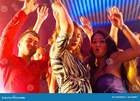 Party People Dancing In Disco Or Club Stock Photo Image Of Asian