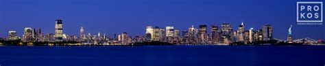 Panoramic View Of New York City And Harbor At Night Framed Photo By