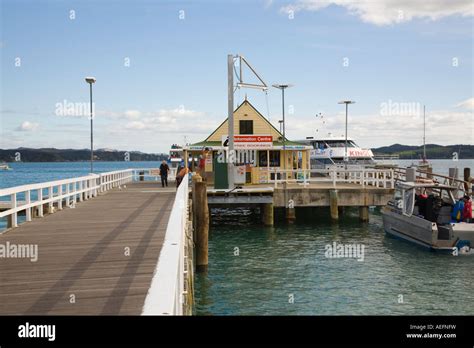 View Along Wooden Pier To Tourist Information Centre And Tourist Cruise